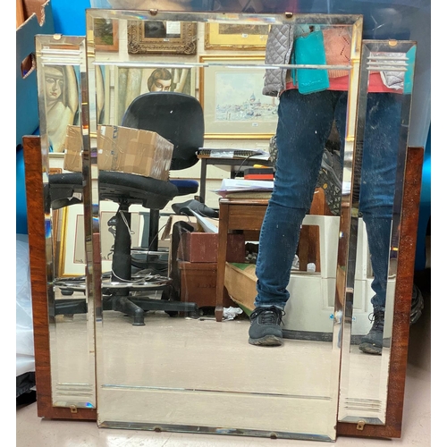 824 - An Art Deco bevelled glass wall mirror with walnut mount, 68 x 62cm overall