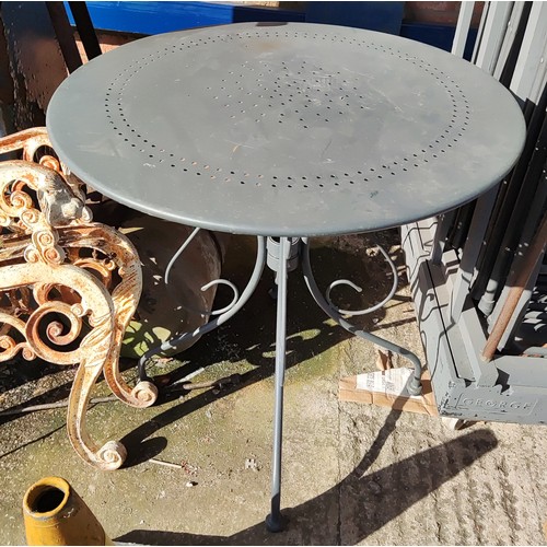 950B - A modern circular grey metal garden table