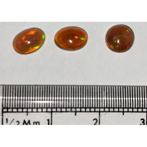 718A - Three oval cabochon cut opals, 1.75 carats