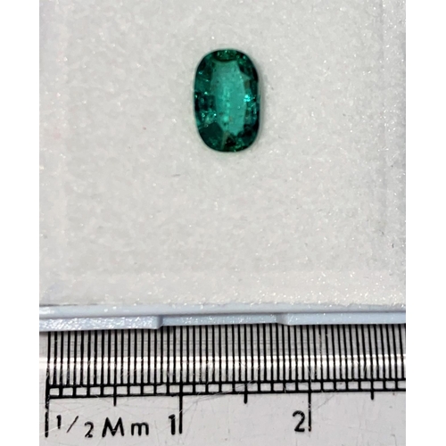 718C - An oval cut emerald, 0.58 carats