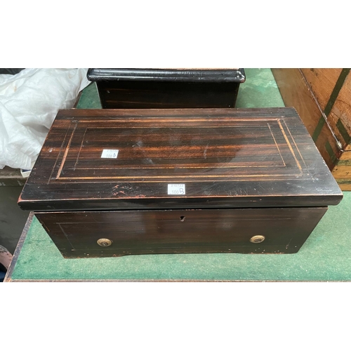 100B - An inlaid rosewood effect cased cylinder music box, 35cm