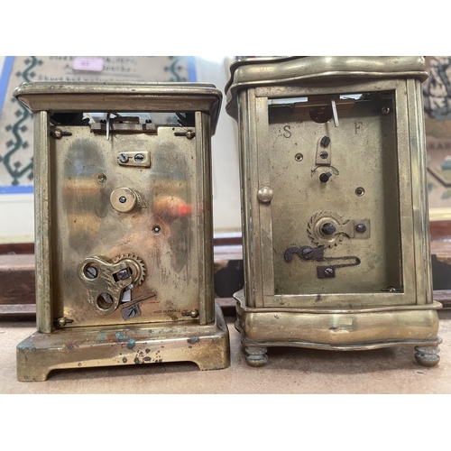 121A - Two French brass carriage clocks enamel faces, (in need of restoration)