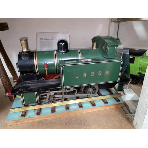 100 - A live steam 0-4-0 tank locomotive in green livery, 10cm track gauge, 50cm