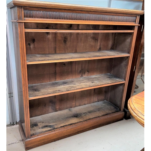 818 - An early 20th century walnut 4 height bookcase