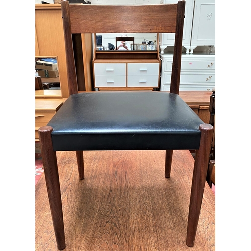 819a - A Scandinavian teak dining suite comprising extending dining table, 4 chairs with black leather effe... 