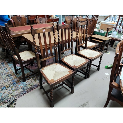 934 - A set of 6 oak barley twist dining chairs with rush seats