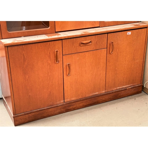 951 - A 20th century teak G-Plan sideboard with three cupboards and single drawer, length 132cm