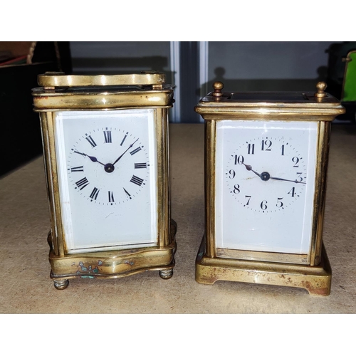 121A - Two French brass carriage clocks enamel faces, (in need of restoration)