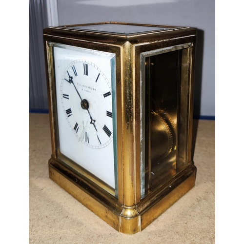 121B - A 19th century French carriage clock by F .L. Hansbury of Paris, four glass bevelled sides and a bra... 