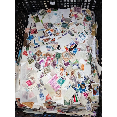 204B - A quantity of unsorted loose stamps