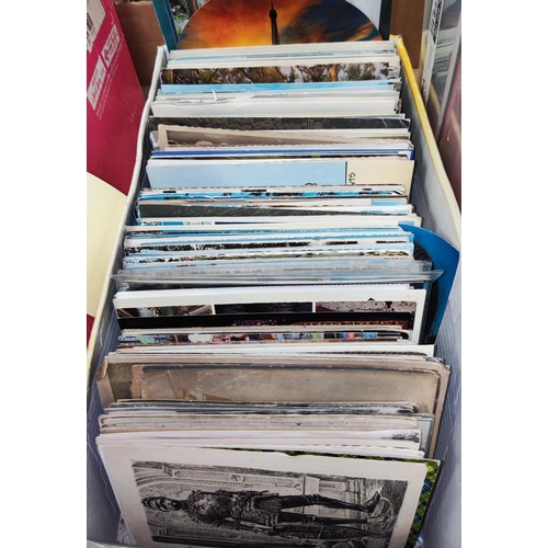 213 - A large quantity of vintage postcards