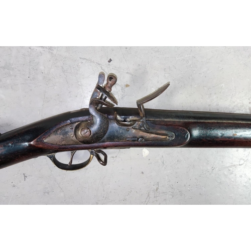 215A - A 19th early 20th century East India Trading Company style flint-lock rifle length 140cm