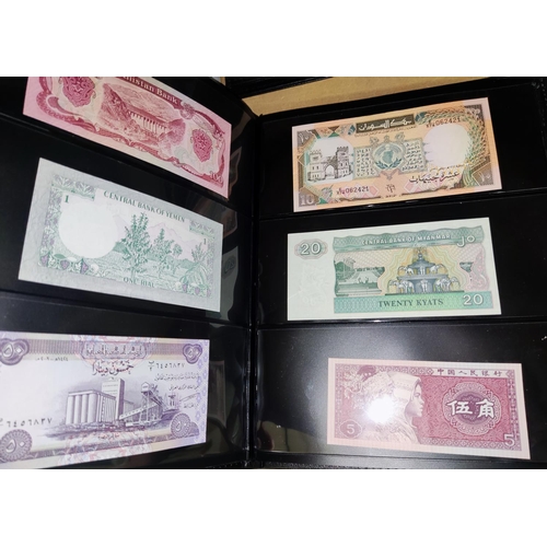 251 - A collection of 77 world banknotes in album