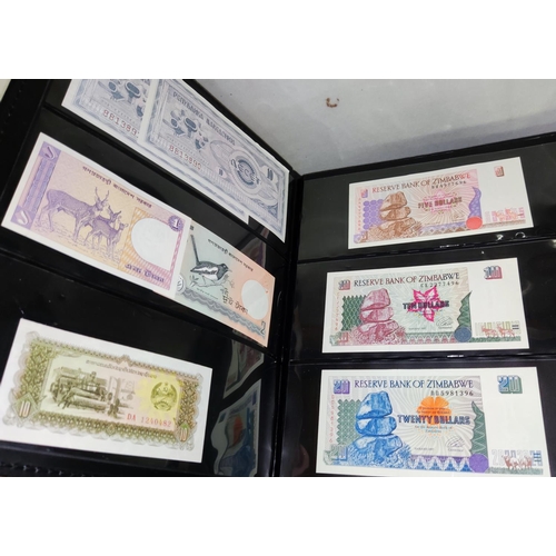 252 - A collection of 72 world banknotes in album