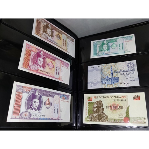 252 - A collection of 72 world banknotes in album