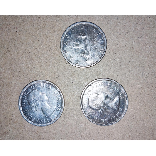 257 - CANADA: 3 1950's silver dollars
