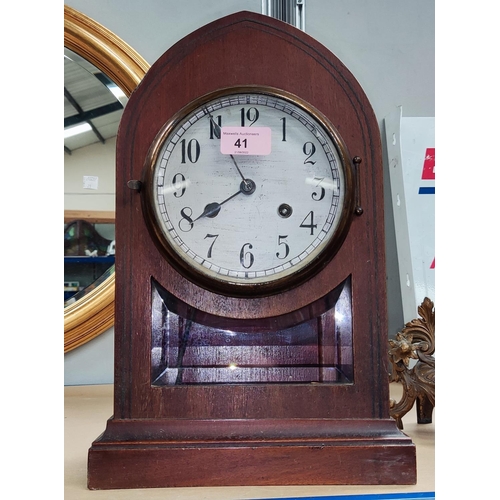 41 - A mantel clock with silvered dial in inlaid mahogany lancet top case (no pendulum)We have been unabl... 