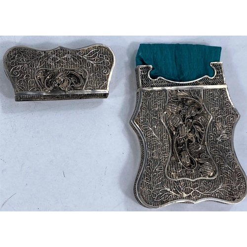 414 - A Chinese silver filigree card case decorated with a dragon, 19th century, unmarked, 10 x 6.4cm (min... 