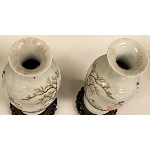 459 - A Chinese pair of late 19th/early 20th century vases decorated with old man and younger boy, four ch... 