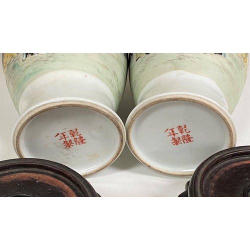 459 - A Chinese pair of late 19th/early 20th century vases decorated with old man and younger boy, four ch... 