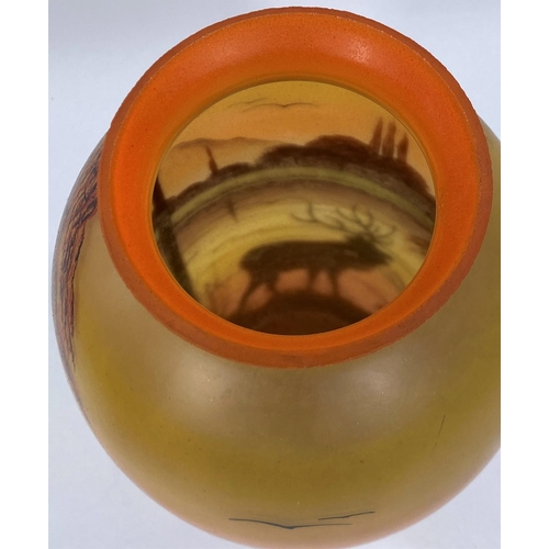 536 - A 1920's French enamelled ovoid vase, sunset scene with stag, signed JOMA, with paper label