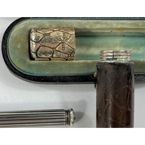 682A - A Sampson Mordan silver topped leather perfume bottle and a Sampson Morden & Co combination dip ... 
