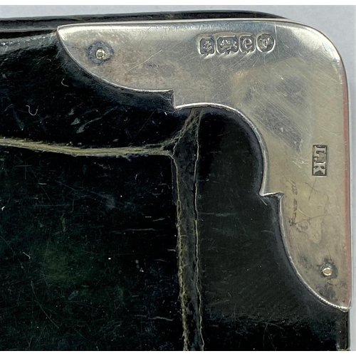 685A - A hallmarked silver mounted reptile wallet, dark green, monogrammed C.A.P. Birmingham 1904, maker Lu... 