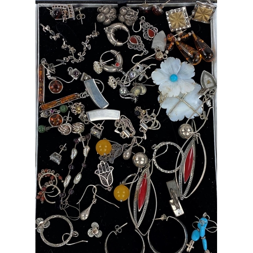 691 - Approximately 36 pairs of silver and white metal earrings, most marked 925, some gem set.