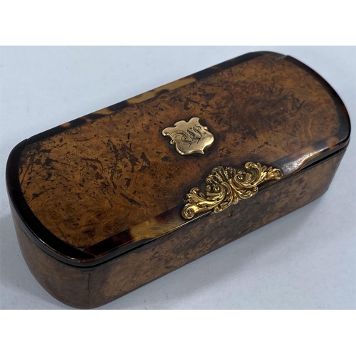 691B - A 19th century walnut and tortoiseshell snuff box, yellow metal mounts (slightly damaged)