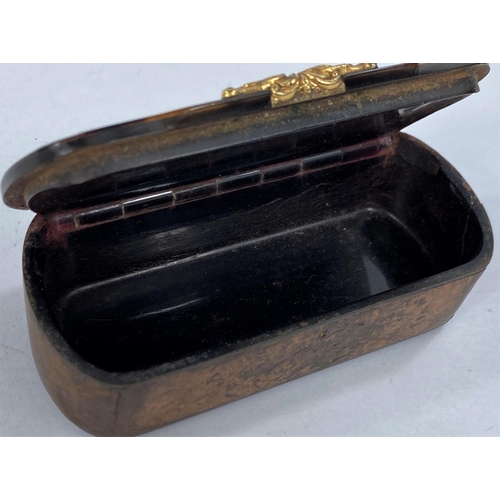 691B - A 19th century walnut and tortoiseshell snuff box, yellow metal mounts (slightly damaged)