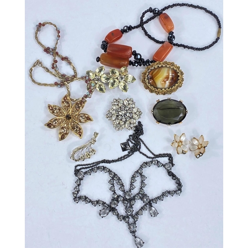 700D - A selection of costume brooches, necklaces etc