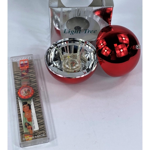 709 - A Swatch Watch originally boxed 'The Light Tree' Christmas special 1996; A Swatch Watch in orig... 
