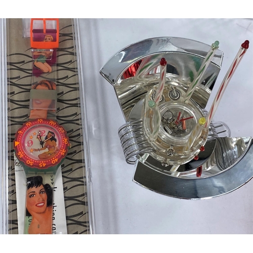 709 - A Swatch Watch originally boxed 'The Light Tree' Christmas special 1996; A Swatch Watch in orig... 
