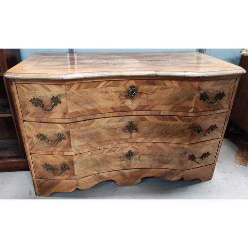 782 - An 18th century South German baroque commode  chest of three long drawers, quarter veneered walnut w... 