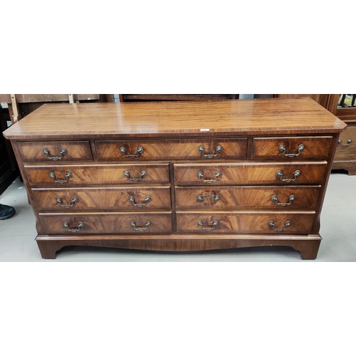 808 - A reproduction Regency mahogany sideboard with 9 drawers