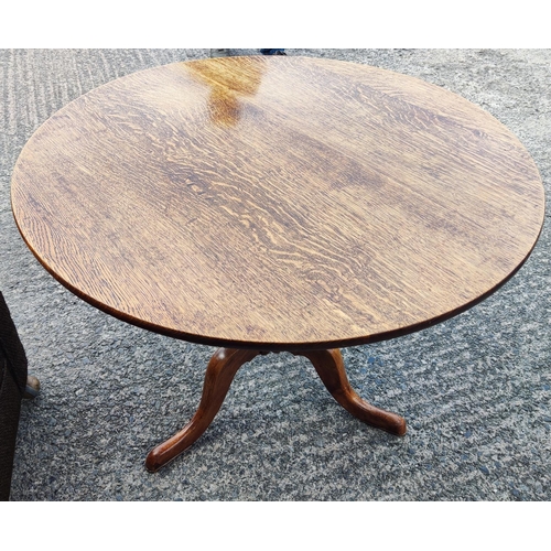 920 - A 19th century oak tilt top occasional table on pedestal with three splay feet