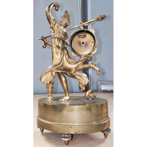 121 - A late 19th century gilt mantel clock with small enamel dial, Arabic numerals with female with staff... 