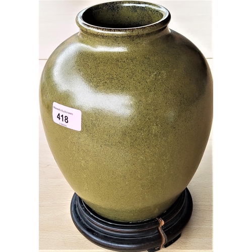 418 - A Chinese vase with tea dust coloured glaze, incised 6 character mark to base, with associated woode... 