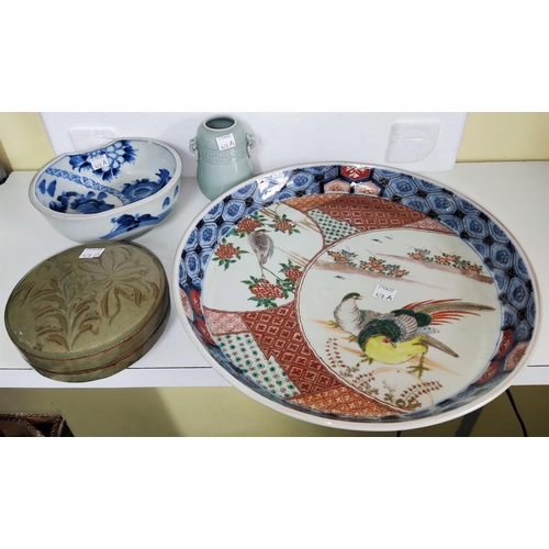 428A - A Japanese high sided dish Imari patter decoration with birds, a blue and white bowl, Celadon vase a... 