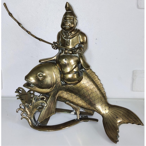 432 - A Japanese bronze incense burner of fisherman riding large fish length 26cm height 25cm