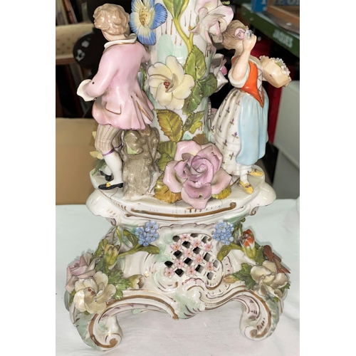 484 - A 19th century continental porcelain floral encrusted table centre with fruit bowl, applied figures,... 