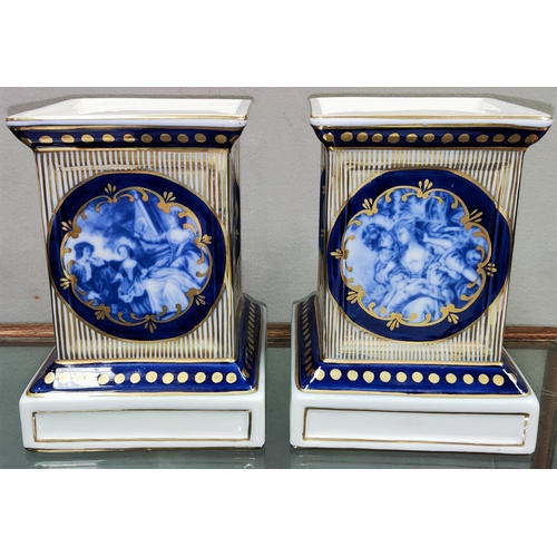 504 - A pair of blue & white square plinths with gilt highlights in the Royal Vienna style, height 8.5... 