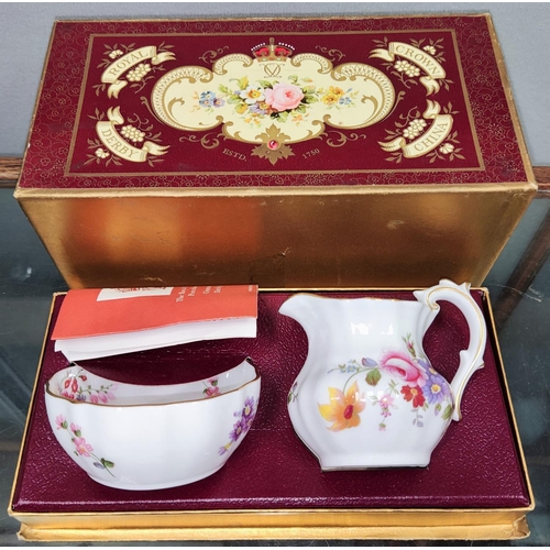 506 - A Royal Crown Derby Posies milk jug and sugar bowl, boxed