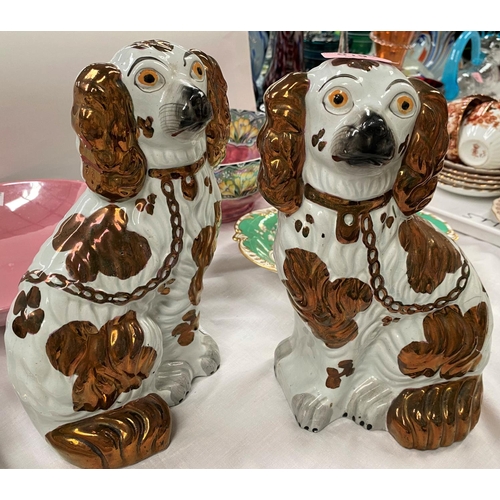 519 - A pair of Staffordshire lustre glaze dogs, a lustre maling bowl, another lustre bowl and a Minton st... 