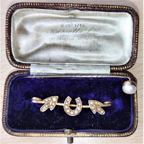 604 - A yellow metal horseshoe brooch set seed pearls; a yellow metal pearl set stick pin, 2.8 gm