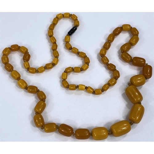 614 - A vintage butterscotch bead necklace, gross weight 142gm