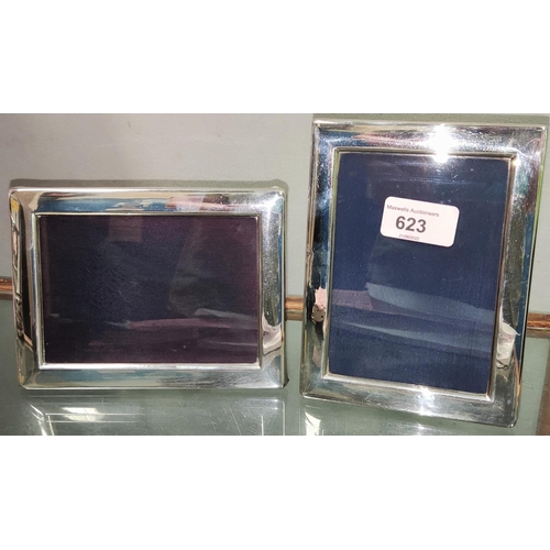 623 - A hallmarked silver matched pair of picture frames, 15.5 x 12 cm, Sheffield 1982 & 1989