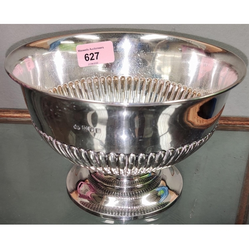 627 - A hallmarked silver rose bowl with ribbed decoration, on foot, London 1966, diameter 18.5 cm; 13 oz