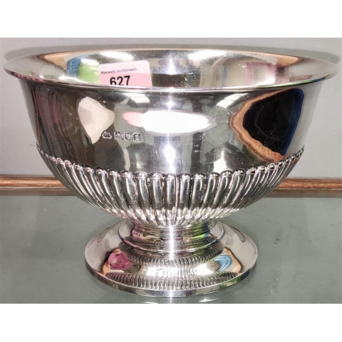 627 - A hallmarked silver rose bowl with ribbed decoration, on foot, London 1966, diameter 18.5 cm; 13 oz
