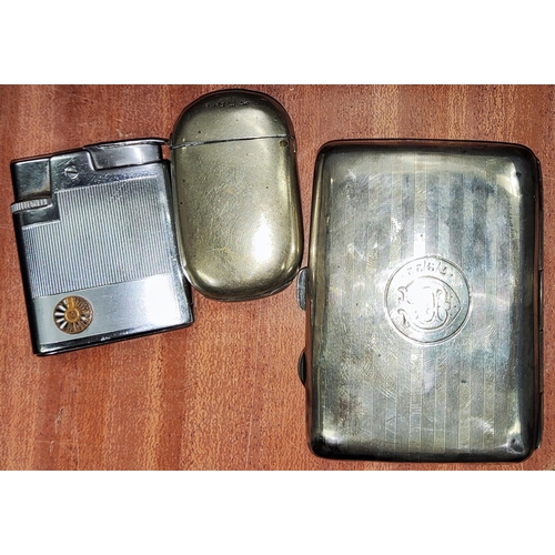 643 - A hallmarked silver cigarette case Birmingham 1920, 2.1oz, a plated vesta case and a selection of bo... 
